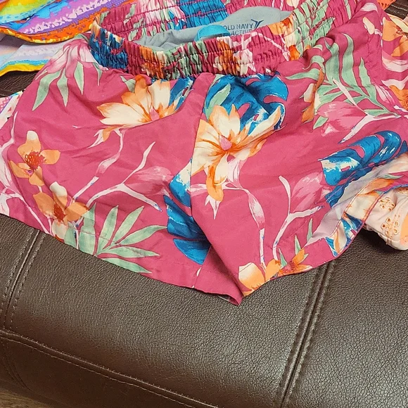 Three bikinis size 6-7 with suze 8 shorts